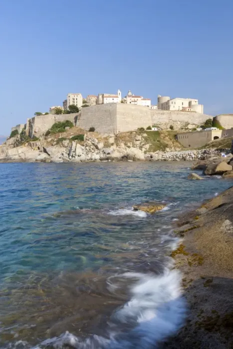 Framed Print : The old fortified citadel on the promontory surrounded by the clear sea, Calvi, Balagne Region