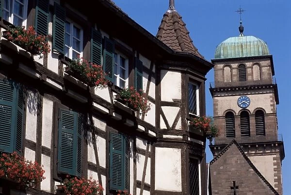 Old house and Ste. Coix church, Kayserberg, Alsace, France, Europe