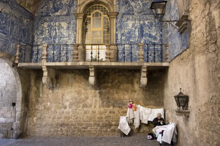 Framed Print : Old lady selling embroidery in the walled medieval town of Obidos, declared national monument, Estremadura, Portugal, Europe Framed Print : Old lady selling embroidery in the walled medieval town of Obidos, declared national monument, Estremadura, Portugal, Europe