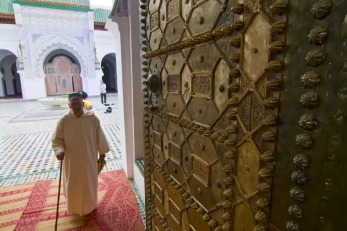 Framed Print : Old man leaving a mosque in the old Medina, UNESCO World Heritage Site Framed Print : Old man leaving a mosque in the old Medina, UNESCO World Heritage Site