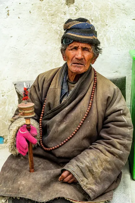 Framed Print : Old man with a prayer wheel in his hand, Kingdom of Mustang, Nepal, Asia Framed Print : Old man with a prayer wheel in his hand, Kingdom of Mustang, Nepal, Asia