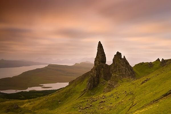 Old Man of Storr at dawn with Cuillin Hills in distance, near Portree, Isle of Skye