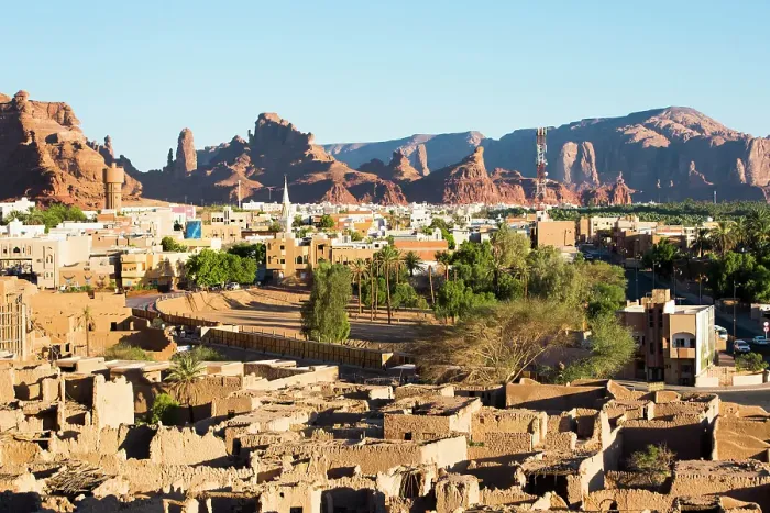 Framed Print : Old mudbrick village under reconstruction with new neighborhoods in the background, in the Old town of AlUla, Medina Province, Saudi Arabia Framed Print : Old mudbrick village under reconstruction with new neighborhoods in the background, in the Old town of AlUla, Medina Province, Saudi Arabia