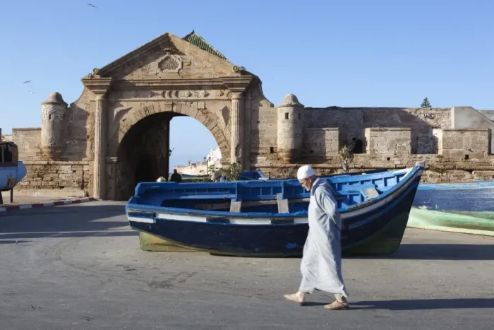 Framed Print : Old Muslim man walking below the old city gate and ramparts, Essaouira, Atlantic coast, Morocco, North Africa, Africa Framed Print : Old Muslim man walking below the old city gate and ramparts, Essaouira, Atlantic coast, Morocco, North Africa, Africa