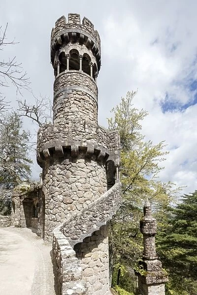 Old mystical tower of Romanesque Gothic and Renaissance style inside the park Quinta da Regaleira