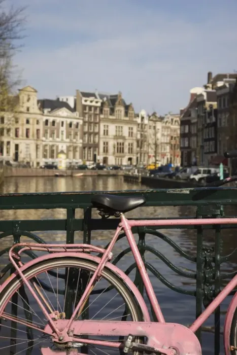 Framed Print : Old pink bicycle by the Herengracht canal, Amsterdam, Netherlands, Europe Framed Print : Old pink bicycle by the Herengracht canal, Amsterdam, Netherlands, Europe