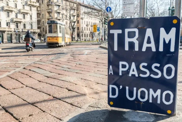 Framed Print : An old sign in Italian that says Trams go to Duomo, with a traditional Milanese tram Framed Print : An old sign in Italian that says Trams go to Duomo, with a traditional Milanese tram