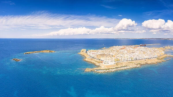 Old town and harbor of Gallipoli on a sunny summer day, aerial view, Lecce province