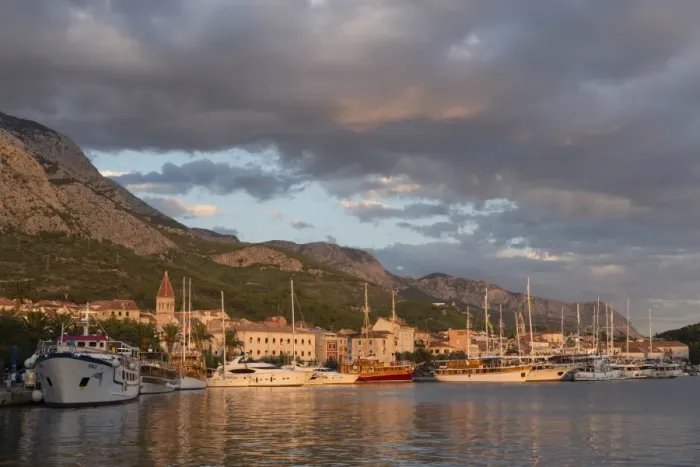 Framed Print : Old town with many Venetian style houses and boats in harbour, Makarska, Croatia, Europe Framed Print : Old town with many Venetian style houses and boats in harbour, Makarska, Croatia, Europe
