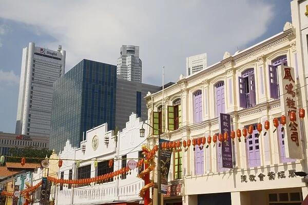 Old traditional shophouses decorated with lanterns for Vesak festival