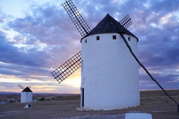 Old traditional windmills at sunset