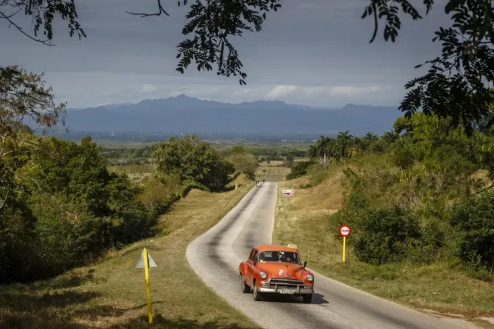 Framed Print : Old vintage American car on a road outside Trinidad, Sancti Spiritus Province, Cuba Framed Print : Old vintage American car on a road outside Trinidad, Sancti Spiritus Province, Cuba