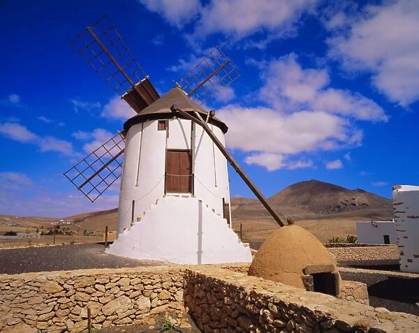 Old windmill with old stone oven