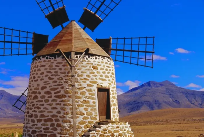 Framed Print : Old Windmill with volcanoes in background near Tefia Framed Print : Old Windmill with volcanoes in background near Tefia