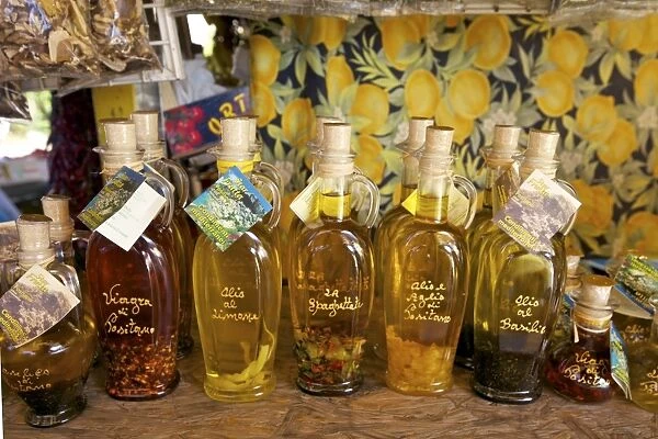 Olive oil for sale on market stall near Positano, Amalfi Coast road, Campania
