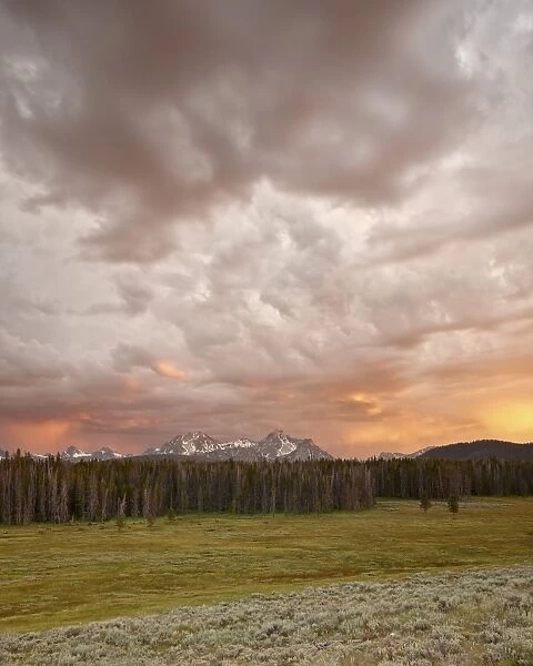 Orange clouds at sunset over The Sawtooth Mountains, Sawtooth National Recreation Area, Idaho, United States of America, North America