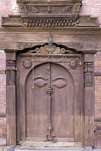 Orate wooden door in the Hanuman Dhoka Royal Palace Complex, Kathmandu, Nepal, Asia
