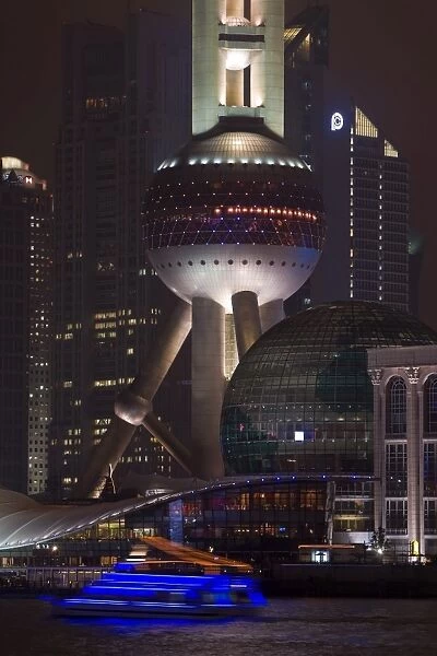 The Oriental Pearl Tower illuminated at night in the Lujiazui financial district of Pudong