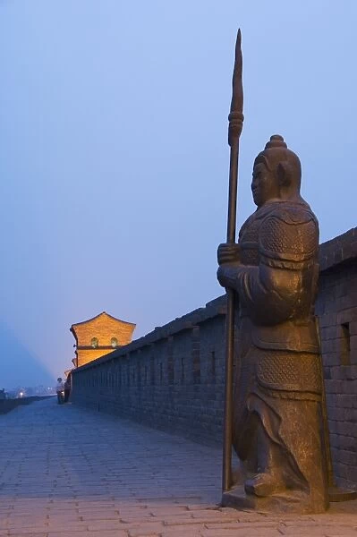 Ornamental guard on the last remaining intact Ming Dynasty city wall in China