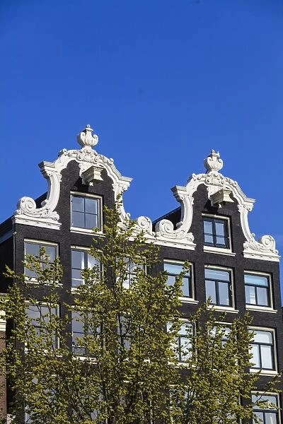 Ornate gabled houses, Amsterdam, Netherlands, Europe