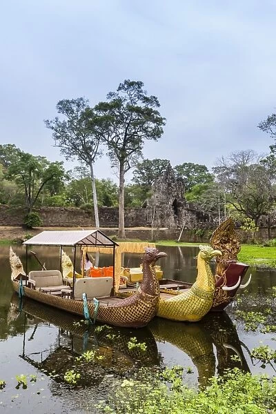 Ornate tourist boats near the South Gate at Angkor Thom, Angkor, UNESCO World Heritage Site, Siem Reap Province, Cambodia, Indochina, Southeast Asia, Asia