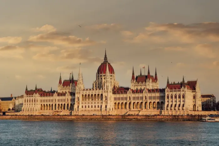 Framed Print : Orszaghaz Parliament neo-Gothic building and River Danube view at sunset, with clouds above, UNESCO World Heritage Site, Budapest, Hungary, Europe Framed Print : Orszaghaz Parliament neo-Gothic building and River Danube view at sunset, with clouds above, UNESCO World Heritage Site, Budapest, Hungary, Europe