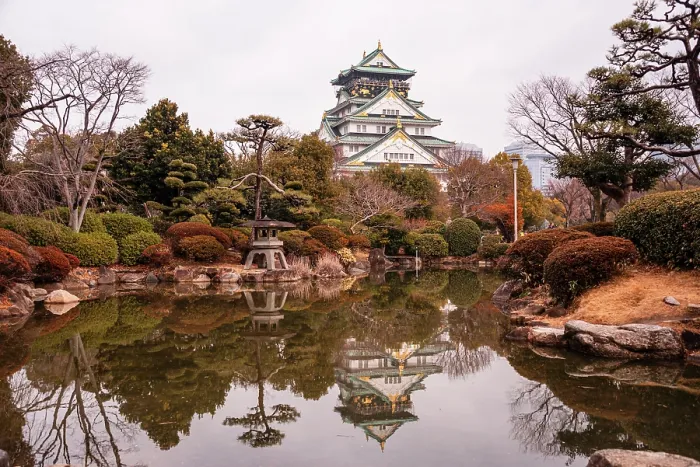 Framed Print : Osaka Castle in Japan Reflecting in a Pond of a japanese Castle. Autumnal Colors in Winter Framed Print : Osaka Castle in Japan Reflecting in a Pond of a japanese Castle. Autumnal Colors in Winter