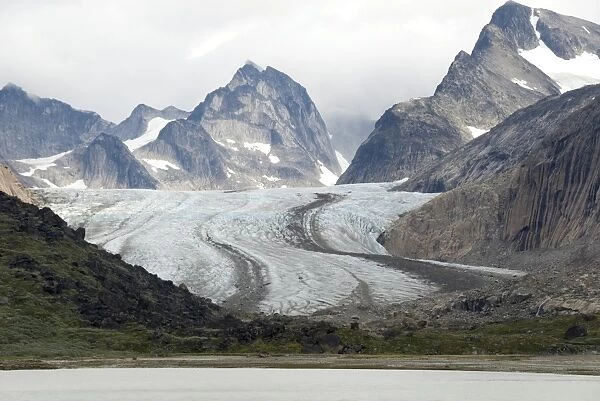 Outlet glacier descending from main ice sheet, along north side of Prins Christian Sund