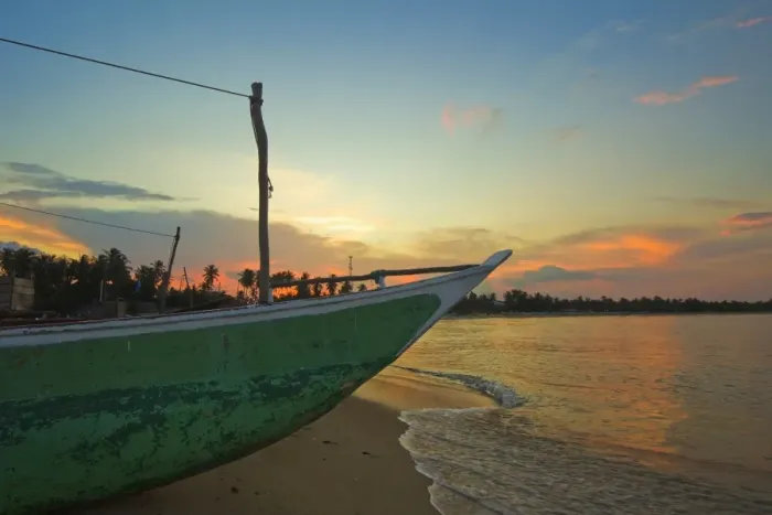 Framed Print : Outrigger boat at sunset at this fishing beach and popular tourist surf destination, Arugam Bay, Eastern Province, Sri Lanka, Asia Framed Print : Outrigger boat at sunset at this fishing beach and popular tourist surf destination, Arugam Bay, Eastern Province, Sri Lanka, Asia