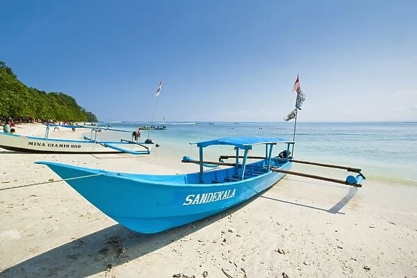 Outrigger boats on beautiful white sand beach in the national park on the south coast at Pangandaran, West Java, Java, Indonesia, Southeast Asia, Asia