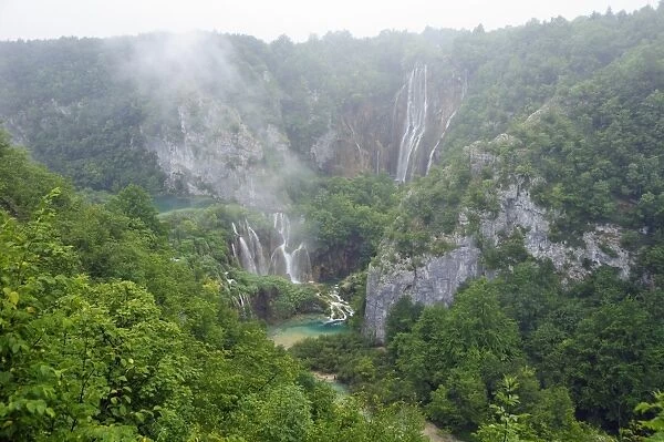 Overview of the great waterfall (Veliki Slap) and Sastavci waterfalls with mist rising, Plitvice Lakes National Park, UNESCO World Heritage Site, Croatia, Europe