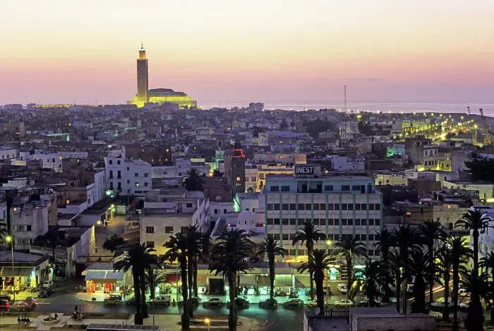 Framed Print : Overview with the Hassan II Mosque in the background at dusk, Casablanca, Morocco Framed Print : Overview with the Hassan II Mosque in the background at dusk, Casablanca, Morocco