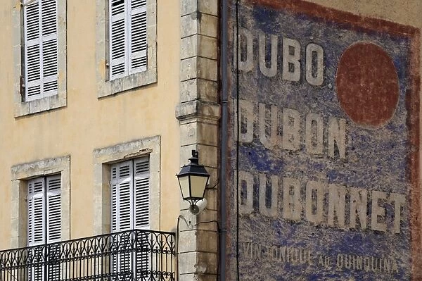 Painted Dubonnet advert on the wall of a building, Belves, Aquitaine, Dordogne