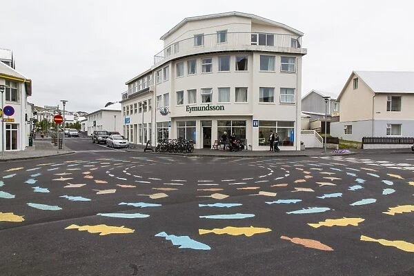Painted fish on traffic circle on Heimaey Island, Iceland, Polar Regions