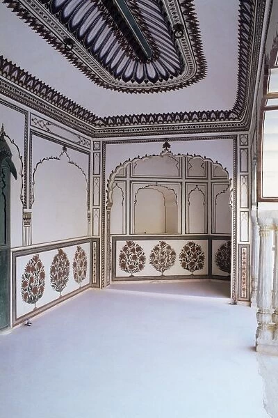 The painted walls of a covered verandah which surrounds