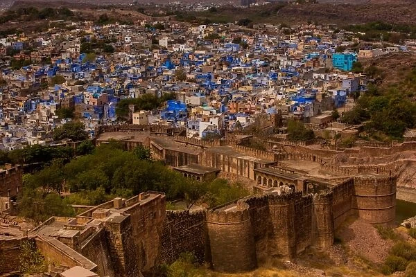 The palace walls of Mehrangarh Fort towering over the blue rooftops in Jodhpur, the Blue City