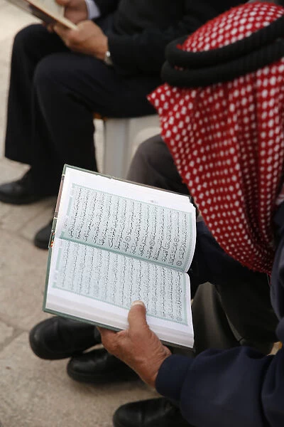 Palestinians reading the Koran outside Al-Aqsa mosque, Jerusalem, Israel, Middle East