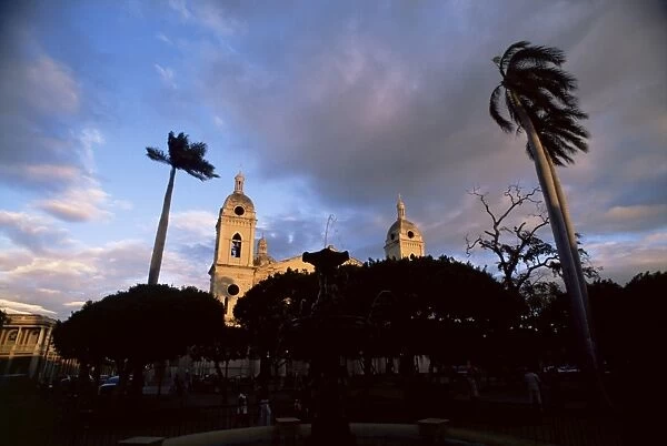 Palm trees in main plaza and Grenada Cathedral