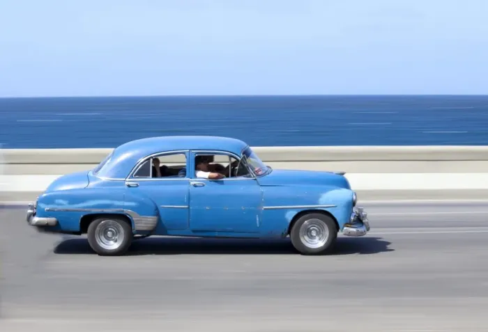Framed Print : Panned shot of old blue American car to capture sense of movement, with the Caribbean Sea in the background, The Malecon, Havana Centro, Cuba, West Indies, Central America Framed Print : Panned shot of old blue American car to capture sense of movement, with the Caribbean Sea in the background, The Malecon, Havana Centro, Cuba, West Indies, Central America
