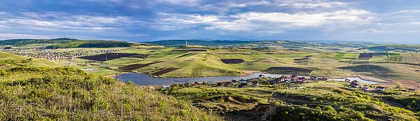 Panorama of Chinteni village and lake in summer, Romania, Europe