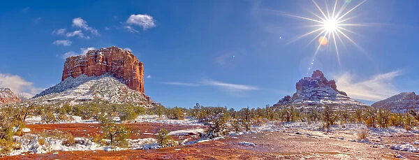 Panorama of Courthouse Butte and Bell Rock with a coating of winter snow on their slopes