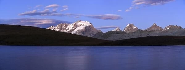 Panorama of the Gran Paradiso range at sunset from Lake Rossett, Colle del Nivolet