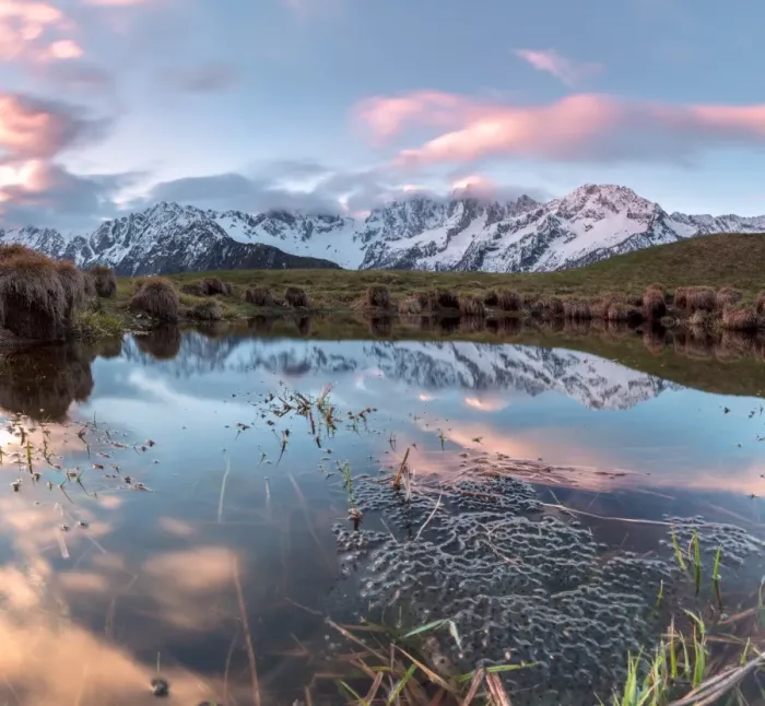 Framed Print : Panorama of pink clouds reflected in water at dawn, Tombal, Soglio, Bregaglia Valley