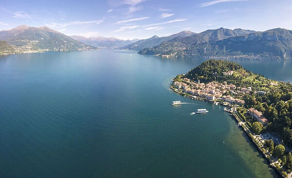 Panoramic aerial view of Bellagio on green promontory surrounded by Lake Como, Province of Como