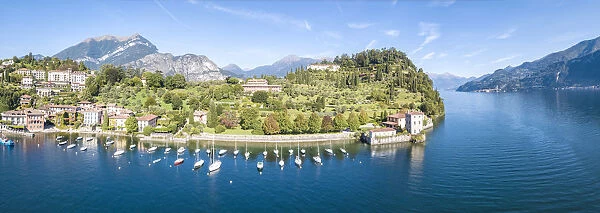 Panoramic aerial view of sailboats in Lake Como around the village of Pescallo, Bellagio