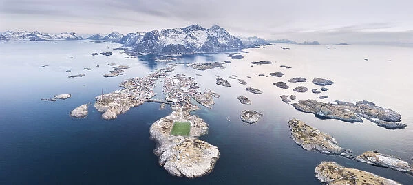 Panoramic aerial view of soccer pitch and islets, Henningsvaer, Vagan municipality