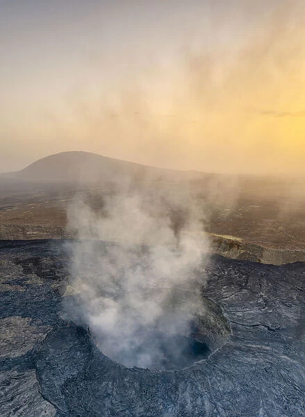Panoramic aerial view of sunset over the active Erta Ale volcano crater