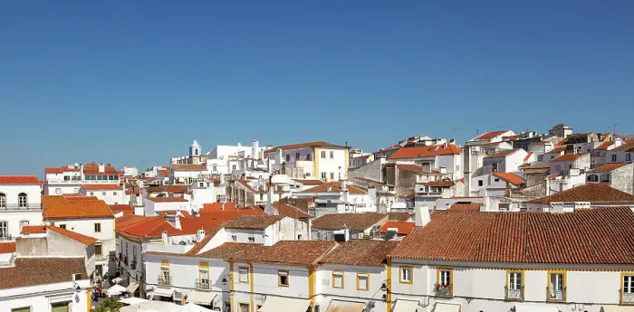 Framed Print : Panoramic cityscape view over pan tile rooftops and whitewashed buildings in the city centre of Evora, Alto Alentejo, Portugal, Europe Framed Print : Panoramic cityscape view over pan tile rooftops and whitewashed buildings in the city centre of Evora, Alto Alentejo, Portugal, Europe