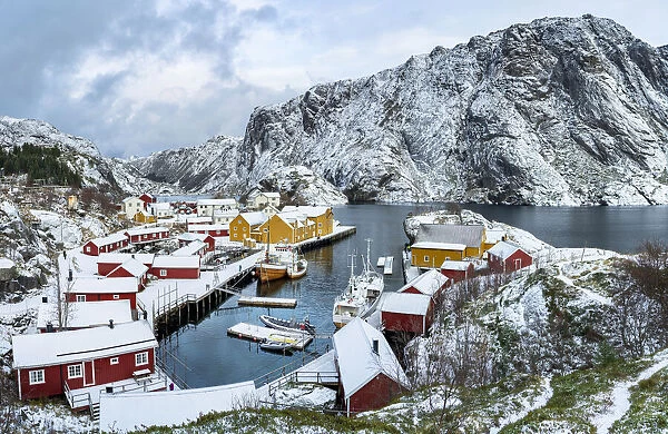 Panoramic of the fishing village of Nusfjord and harbor covered with snow in winter, Nordland, Lofoten Islands, Norway, Scandinavia, Europe