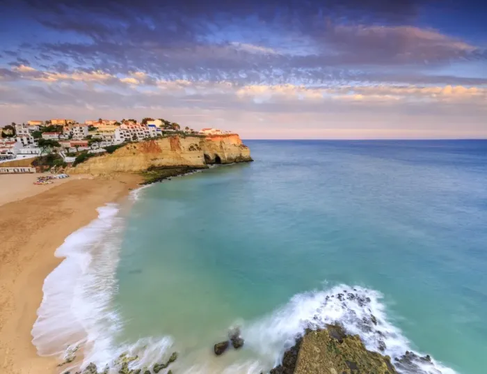 Framed Print : Panoramic view of Carvoeiro village surrounded by sandy beach and clear sea at sunset Framed Print : Panoramic view of Carvoeiro village surrounded by sandy beach and clear sea at sunset